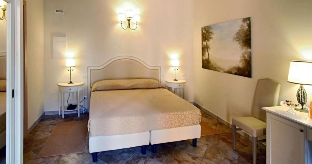 Photo of Bedroom in Corte de'Cortesi Con Cignone
