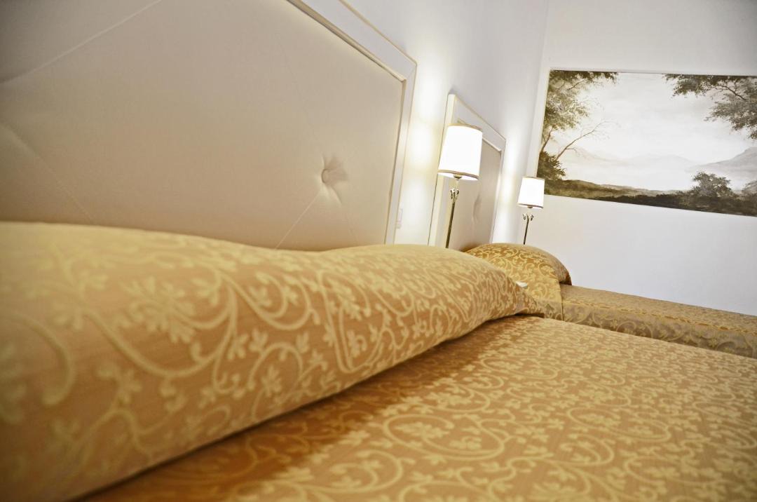 Photo of Bedroom in Corte de'Cortesi Con Cignone