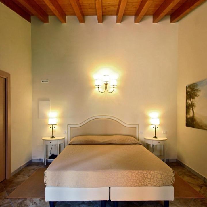 Photo of Bedroom in Corte de'Cortesi Con Cignone
